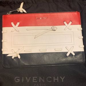 “ authentic” Givenchy black white and red leather clutch.